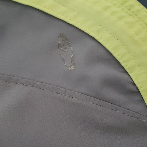 Size small Grey althetic shorts with yellow accents. No outside damage - Picture 2 of 4